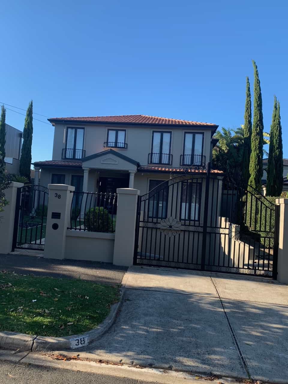 elegant house enclosed by a gate